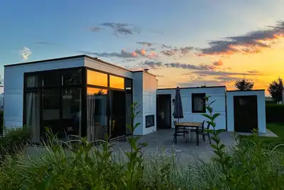 Image de Tolles, Modernes Chalet 'strandleben' mit Zaun & Garten in Strandnähe