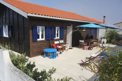Image de Charmante maison en bois, au bout de la rue, la plage