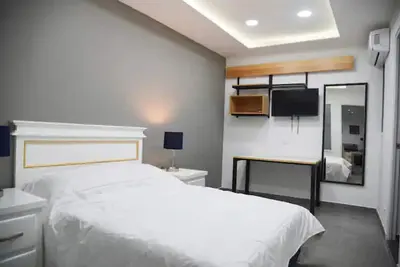 Image de Casa moderna equipada como pequeño hotel habitación 1