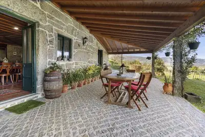 Image de Maison de vacances 'Casa Do Soutinho' avec vue montagne, terrasse privée et climatisation