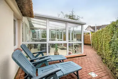 Image de Maison de vacances 'Ferienhaus Bruhn' avec terrasse privée, jardin privé et Wi-Fi