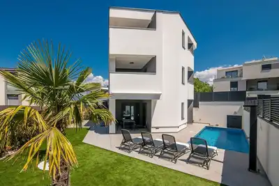 Image de Appartement de deux chambres avec la terrasse Njivice, Krk (A-22806-a)