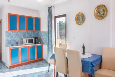 Image de Joli appartement pour 5 personnes avec Wifi, climatisation, Tv, terrasse, animaux admis et parking