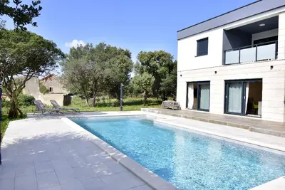 Image de Maison de vacances Vrana pour 1 - 7 personnes avec 3 chambres Ă coucher - Maison de vacances