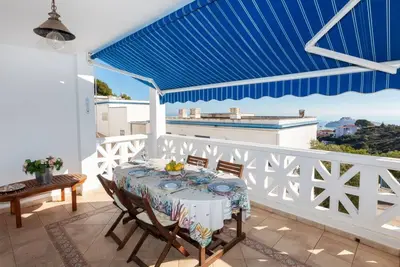 Image de Confortable appartement avec climatisation, Wifi, terrasse, animaux admis et parking
