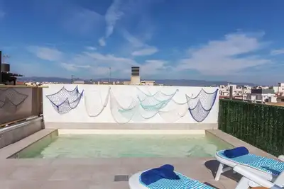 Image de Bel appartement avec climatisation, Wifi, piscine privée, Tv, terrasse, animaux admis et parking