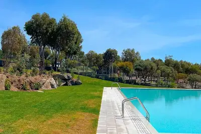 Image de Appartement dans une maison de vacances avec climatisation, Wifi, piscine, Tv, patio, animaux admis