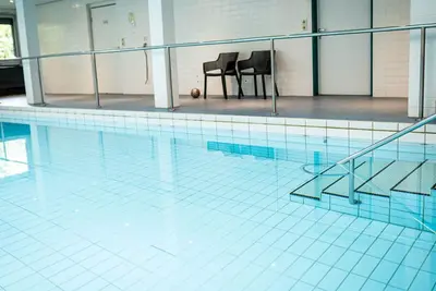 Image de Agréable appartement pour 21 personnes avec piscine, bain à remous, Wifi, terrasse et parking