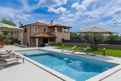 Image de Bel appartement pour 4 personnes avec piscine privée, Wifi, climatisation, Tv, terrasse et parking