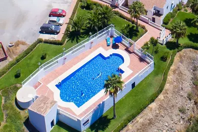 Image de Joli appartement avec climatisation, Wifi, piscine, Tv, terrasse et animaux admis