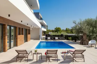 Image de Maison de vacances privée avec climatisation, Wifi, bain à remous, piscine privée, Tv, terrasse