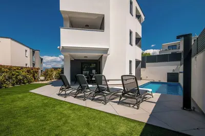 Image de Appartement de vacances avec piscine et climatisation