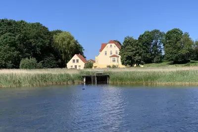 Appartement de vacances \"Gut Grubnow Rügen - 4\" avec vue sur lac, terrasse partagée et Wi-Fi