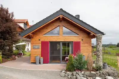 Image de Maison de vacances 'Schorenmoos Lodge' avec terrasse privée, jardin privé et Wi-Fi