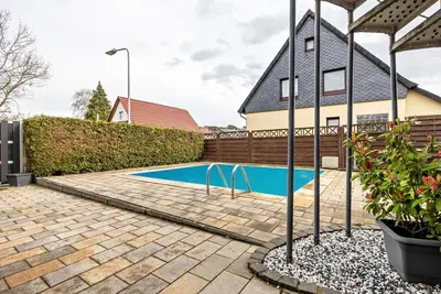 Image de Appartement 'Dini's Ferienwohnung' avec piscine partagée