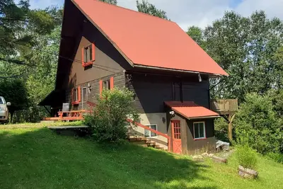 Image de Cozy 2 bedroom with fireplace and small swimmable lake 15 min from Mt Tremblant