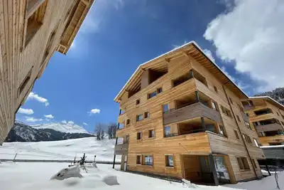 Image de Confortable appartement avec piscine, bain à remous, Wifi, Tv, balcon, vue panoramique et parking