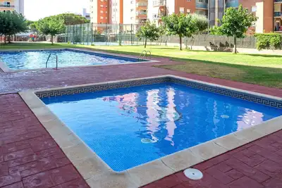 Image de Joli appartement pour 4 personnes avec Wifi, climatisation, piscine, Tv, balcon et parking