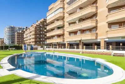 Image de Joli appartement pour 4 personnes avec Wifi, climatisation, piscine, Tv, terrasse et parking