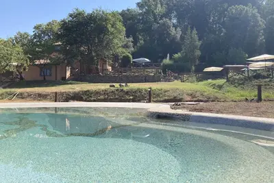 Image de Appartement dans une maison de vacances avec climatisation, Wifi, piscine, Tv, patio, parking