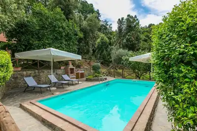 Image de Appartement dans une maison de vacances avec Wifi, piscine, climatisation, Tv, patio, parking