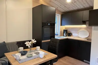 Image de Joli appartement dans une maison de vacances pour 4 personnes avec Wifi, Tv, terrasse et parking
