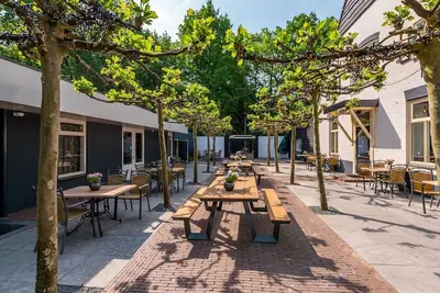 Image de Joli appartement dans une maison de vacances avec Wifi, piscine, Tv, terrasse et parking