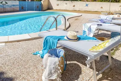 Image de Bel appartement pour 6 personnes avec piscine, climatisation, Wifi, Tv, patio et parking