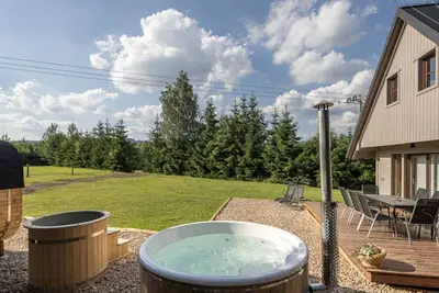 Image de Maison de vacances privée avec Wifi, bain à remous, Tv, terrasse, animaux admis, parking
