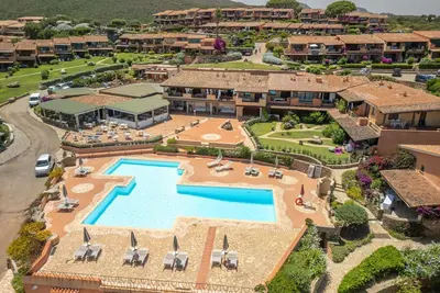 Image de Joli appartement avec piscine, climatisation, Wifi, Tv, patio, animaux admis et parking