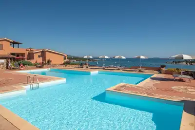 Image de Joli appartement avec piscine, Wifi, climatisation, Tv, terrasse, animaux admis et parking