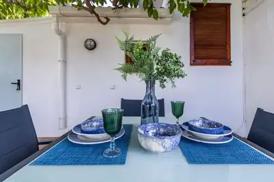 Image de Magnifique maison de vacances privée avec Wifi, climatisation, Tv, patio, animaux admis, parking