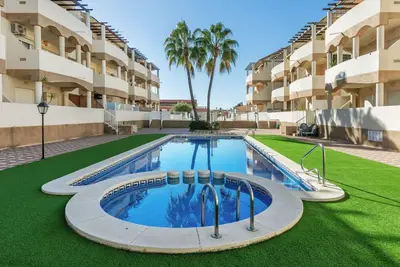Image de Joli appartement pour 4 personnes avec piscine, climatisation, Tv, patio, animaux admis et parking