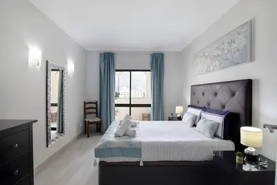 Image de Appartement 'Seaside - Praia Da Rocha' avec vue sur la montagne, piscine partagée et Wi-Fi