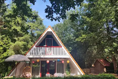 Image de Boshuisje Casa Ciconia, Zeer Kindvriendelijk, Opmaakte Bedden en Eigen Bostuin