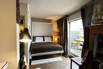 Image de T2 en Studio 30m2 + Terrasse 12 m2, 7 ° avec Ascenseur Parking dans L'Immeuble.
