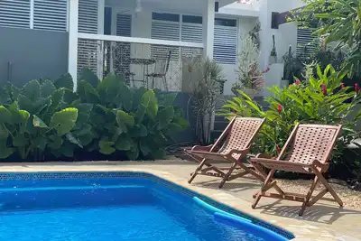 Cool Vibe Island Home with a designer garden & new pool. A/C in bedrooms!