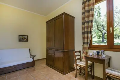 Image de Joli appartement avec climatisation, piscine, Wifi, Tv, animaux admis et parking