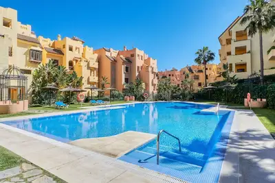 Image de Bel appartement pour 4 personnes avec Wifi, climatisation, piscine, Tv, terrasse et parking