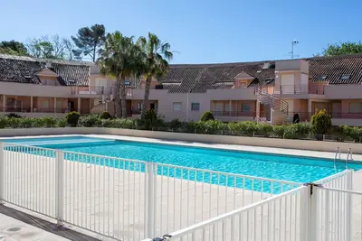 Image de Confortable appartement avec climatisation, Wifi, piscine, Tv, terrasse, animaux admis et parking