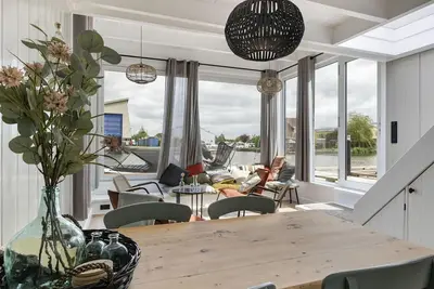 Image de Joli appartement dans une maison de vacances pour 4 personnes avec Wifi, patio et parking