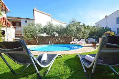 Image de Confortable appartement avec piscine privée, climatisation, Wifi, Tv, terrasse et parking