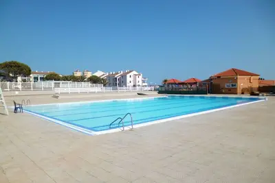 Image de Joli appartement pour 4 personnes avec Wifi, climatisation, piscine, Tv, terrasse et parking