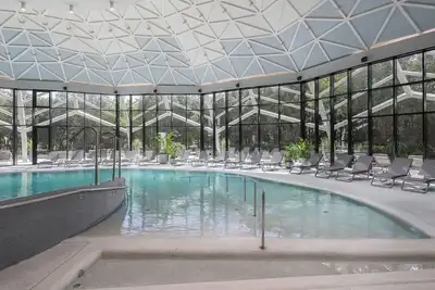 Image de Appartement avec climatisation, bain Ă remous, Wifi, piscine, Tv, terrasse