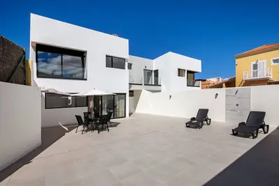 Image de Appartement de vacances 'Las Cuestitas Sol' avec vue sur les montagnes, terrasse privée et Wi-Fi