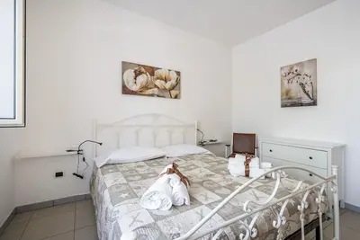 Image de Appartement \"Ulivo\" avec piscine partagée, terrasse privée et Wi-Fi