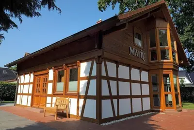 Image de Ferienhaus Marie mit Drei Schlafzimmern, Einem Großzügigen Wohnzimmer und Zwei Bädern. Zwei Stellplätze und Zugang zur Hauseigenen Sauna Sind Inkl