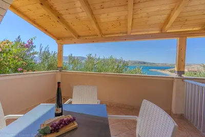 Image de Apartment directly at the beach, shared terrace on the beach with grill