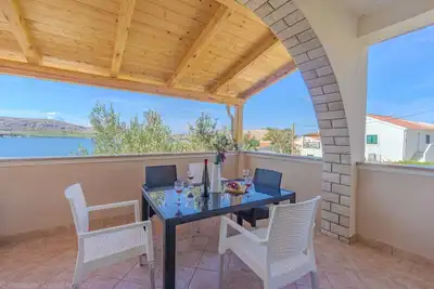Image de Apartment directly at the beach, shared terrace on the beach with grill