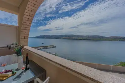 Image de Apartment directly at the beach, shared terrace on the beach with grill